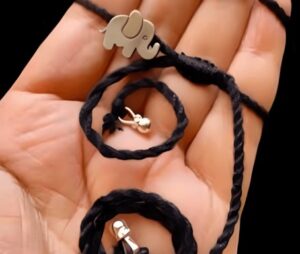 black thread with elephant locket