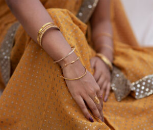 wearing gold jewellery 