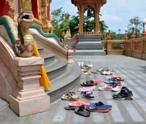Shoes and Slippers Outside The Temple